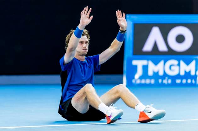 MELBOURNE, VIC - JANUARY 23: Andrey Rublev of Russia acknowledges his opponent after getting up off the ground after realising he won his match during Round 4 of the 2023 Australian Open on January 23 2023, at Melbourne Park in Melbourne, Australia. (Photo by Jason Heidrich Icon Sportswire) TENNIS: JAN 23 Australian Open Icon230123138