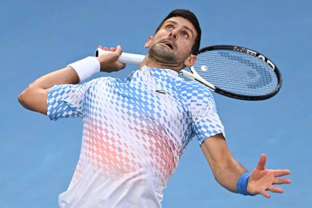 TENNIS AUSTRALIAN OPEN, Novak Djokovic of Serbia serves during his match against Alex de Minaur of Australia during the 2023 Australian Open tennis tournament at Melbourne Park in Melbourne, Monday, January 23, 2023. ( NO ARCHIVING, EDITORIAL USE ONLY, NO USE IN BOOKS WITHOUT CONSENT MELBOURNE VICTORIA AUSTRALIA  Copyright: xJOELxCARRETTx 20230123001755819274