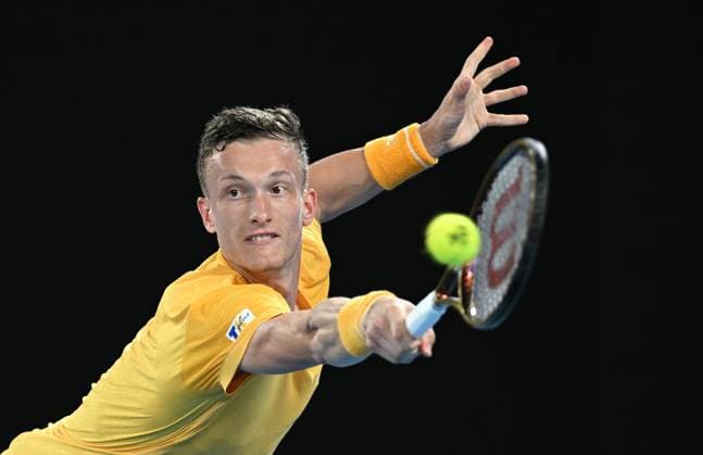 TENNIS AUSTRALIAN OPEN, Jiri Lehecka of Czech Republic returns to Stefanos Tsitsipas of Greece during their quarter final match at the 2023 Australian Open tennis championship at Melbourne Park in Melbourne, Tuesday, January 24, 2023. ( NO ARCHIVING, EDITORIAL USE ONLY, NO USE IN BOOKS WITHOUT CONSENT MELBOURNE VICTORIA AUSTRALIA  Copyright: xLUKASxCOCHx 20230124001756110090