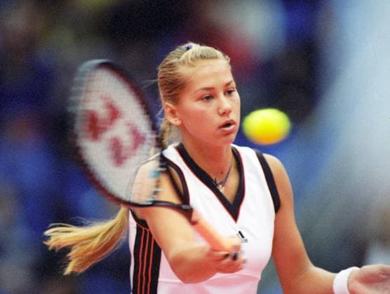 Moscow, Russia. Russian tennis player Anna Kurnikova competes in the match against Italian sportswoman Silvia Farina Elia during the 1998 Kremlin Cup in the closed court at the Olympic Stadium. Roman Denisov TASS  1505625