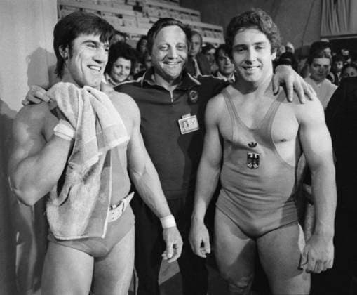 June 10-18, 1978. Havirov, Czechoslovak Socialist Republic. Soviet weighlifter David Rigert, who won a gold medal in the men s under 90 kg event, his coach Rudolf Plyukfelder and German weightlifter Rolf Milser, who won a silver medal, (L-R) pose for a photo at the 57th European Weightlifting Championships. The exact date of the photograph is unknown. Igor Utkin TASS  17232749