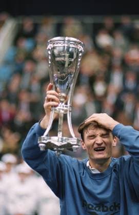 Moscow, Russia. Tournament winner, Russian tennis player Alexander Volkov lifts the cup after the award ceremony of winners of the 1994 Kremlin Cup at the Olympic Stadium. Igor Utkin, Alexander Yakovlev TASS  17741603