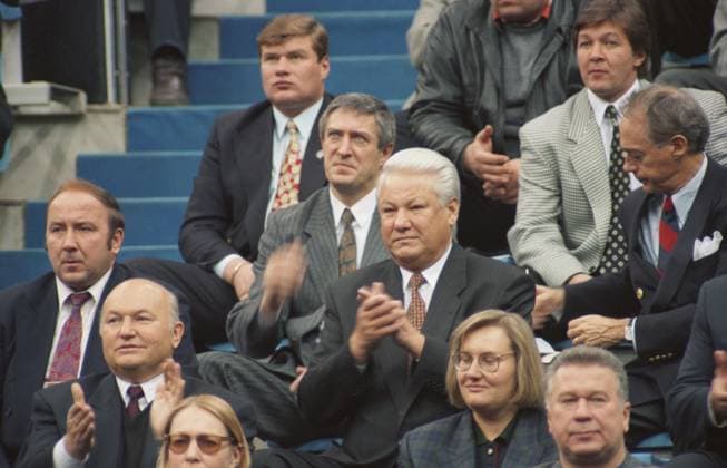 Moscow, Russia. Mayor of Moscow Yuri Luzkov (L front), head of the Presidential Security Service of the Russian Federation Alexander Korzhakov and President of Russia Boris Yeltsin (L-R 2nd row) visit the final tennis match of the 1994 Kremlin Cup at the Olympic Stadium. Igor Utkin, Alexander Yakovlev TASS  18340813