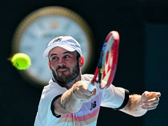 (230125) -- MELBOURNE, Jan. 25, 2023 -- Tommy Paul of the United States hits a return during the men s singles quarterfinal against his compatriot Ben Shelton at Australian Open at Melbourne Park in Melbourne, Australia, Jan. 25, 2023. ) (SP)AUSTRALIA-MELBOURNE-TENNIS-AUSTRALIAN OPEN-MEN S SINGLES-QUARTERFINALS GuoxLei 