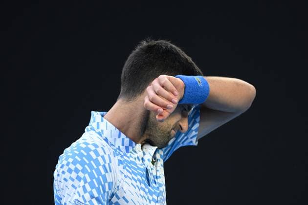 TENNIS AUSTRALIAN OPEN, Novak Djokovic of Serbia reacts during his Quarterfinal match agains Andrey Rublev at the 2023 Australian Open tennis tournament at Melbourne Park in Melbourne, Wednesday, January 25, 2023. ( NO ARCHIVING, EDITORIAL USE ONLY, NO USE IN BOOKS WITHOUT CONSENT MELBOURNE VICTORIA AUSTRALIA  Copyright: xJAMESxROSSx 20230125001756406646