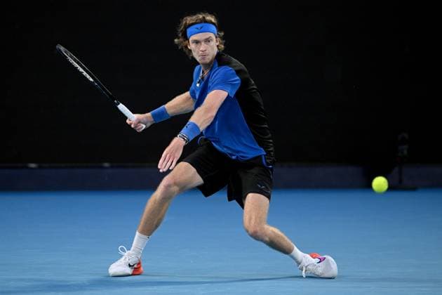 TENNIS AUSTRALIAN OPEN, Andrey Rublev in action during his Quarterfinal match against Novak Djokovic of Serbia at the 2023 Australian Open tennis tournament at Melbourne Park in Melbourne, Wednesday, January 25, 2023. ( NO ARCHIVING, EDITORIAL USE ONLY, NO USE IN BOOKS WITHOUT CONSENT MELBOURNE VICTORIA AUSTRALIA  Copyright: xJAMESxROSSx 20230125001756414362