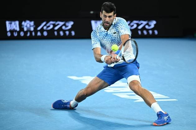 TENNIS AUSTRALIAN OPEN, Novak Djokovic of Serbia in action during his Quarterfinal match agains Andrey Rublev at the 2023 Australian Open tennis tournament at Melbourne Park in Melbourne, Wednesday, January 25, 2023. ( NO ARCHIVING, EDITORIAL USE ONLY, NO USE IN BOOKS WITHOUT CONSENT MELBOURNE VICTORIA AUSTRALIA  Copyright: xJAMESxROSSx 20230125001756418720