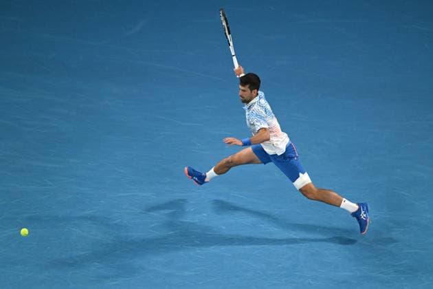 TENNIS AUSTRALIAN OPEN, Novak Djokovic of Serbia in action during his Quarterfinal match agains Andrey Rublev at the 2023 Australian Open tennis tournament at Melbourne Park in Melbourne, Wednesday, January 25, 2023. ( NO ARCHIVING, EDITORIAL USE ONLY, NO USE IN BOOKS WITHOUT CONSENT MELBOURNE VICTORIA AUSTRALIA  Copyright: xLUKASxCOCHx 20230125001756423934