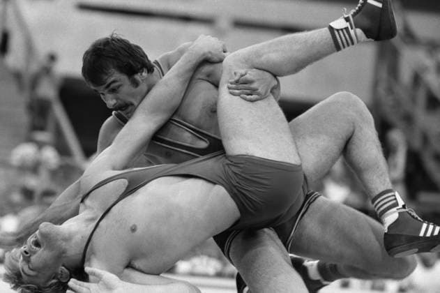 Moscow, USSR. July 31, 1980. Soviet athlete Ilya Mate (up), who won the gold medal, and Czechoslovak athlete Julius Strnisko (down), who won the bronze medal, compete in the men s freestyle 57 kg during the 1980 Summer Olympic Games, Olympische Spiele, Olympia, OS at the CSKA Sports Complex on Leningradsky Prospekt. Alexander Sentsov TASS  32395457
