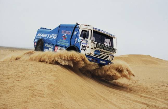 Mongolia. KamAZ-Master team member, Russian racer Viktor Moskovskikh drives the KamAZ-49251 during the World Cup off-road rally sports event of the 1996 Master Rally en route Paris - Ulaanbaatar in the Gobi desert. Mikhail Medvedev TASS  32487329