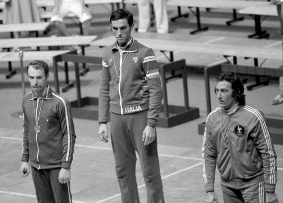 Montreal, Canada. Winners of the men s individual foil fencing event at the 1976 Summer Olympics Alexander Romankov (USSR, silver), Fabio Dal Zotto(USSR, gold) and Bernard Talvard (France, bronze) (L-R) stand on the Olympic podium during the award ceremony at the Stadium of the Physical Education and Sports Centre of University of Montreal (CEPSUM). Viktor Budan, Yashar Khalilov TASS  5421088