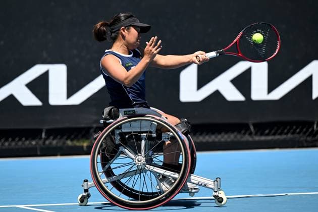 TENNIS AUSTRALIAN OPEN, Yui Kamiji of Japan plays a shot during the Women?s Wheelchair Doubles final with Shenzhen Zhu of China against Diede De Groot and Aniek Van Koot of the Netherlands at the 2023 Australian Open tennis championship at Melbourne Park in Melbourne, Thursday, January 26, 2023. ( NO ARCHIVING, EDITORIAL USE ONLY, NO USE IN BOOKS WITHOUT CONSENT MELBOURNE VICTORIA AUSTRALIA  Copyright: xLUKASxCOCHx 20230127001756999848