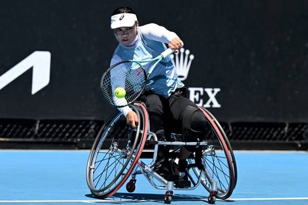 TENNIS AUSTRALIAN OPEN, Shenzhen Zhu of China plays a shot during the Women?s Wheelchair Doubles final with Yui Kamiji of Japan, against Diede De Groot and Aniek Van Koot of the Netherlands at the 2023 Australian Open tennis championship at Melbourne Park in Melbourne, Thursday, January 26, 2023. ( NO ARCHIVING, EDITORIAL USE ONLY, NO USE IN BOOKS WITHOUT CONSENT MELBOURNE VICTORIA AUSTRALIA  Copyright: xLUKASxCOCHx 20230127001757000423