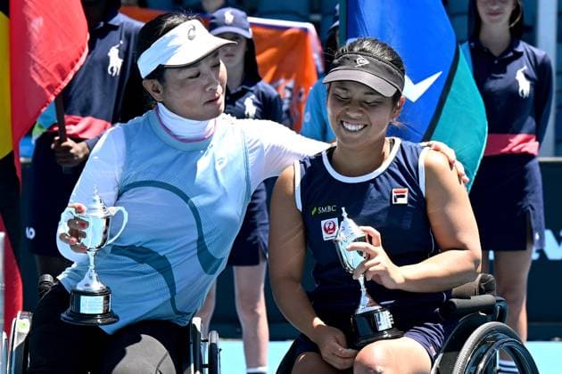 TENNIS AUSTRALIAN OPEN, Zhenzhen Zhu of China (left) and Yui Kamiji of Japan, embrace after being presented with their runners up trophies for the Women?s Wheelchair Doubles final against Diede De Groot and Aniek Van Koot of the Netherlands at the 2023 Australian Open tennis championship at Melbourne Park in Melbourne, Friday, January 27, 2023. ( NO ARCHIVING, EDITORIAL USE ONLY, NO USE IN BOOKS WITHOUT CONSENT MELBOURNE VICTORIA AUSTRALIA  Copyright: xLUKASxCOCHx 20230127001757017722