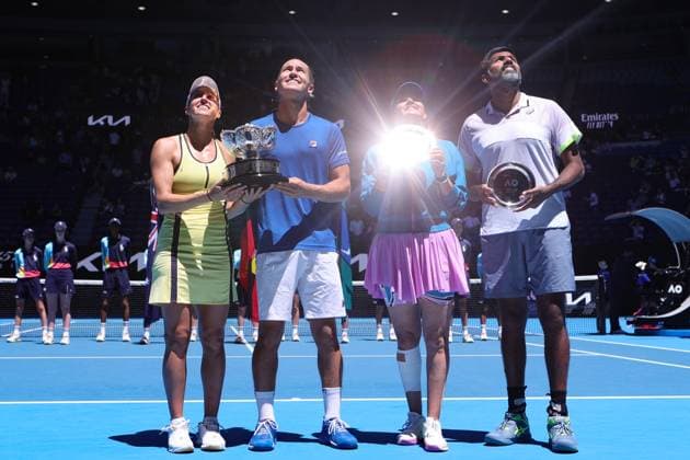 Sport Bilder des Tages Luisa Stefani and Rafael Matos of Brazil and Sania Mirza and Rohan Bopanna of Indi show their trophies in the Mixed Doubles Final match, Day 12 at the Australian Open Tennis 2023 at Rod Laver Arena, Melbourne, Australia on 27 January 2023. Copyright: xPeterxDovganx 34782433
