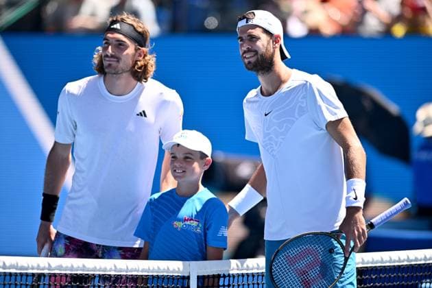 TENNIS AUSTRALIAN OPEN, Stefanos Tsitsipas of Greece and Karen Khachanov of Russia pose for a photograph ahead of their Men?s semi final match at the 2023 Australian Open tennis championship at Melbourne Park in Melbourne, Friday, January 27, 2023. ( NO ARCHIVING, EDITORIAL USE ONLY, NO USE IN BOOKS WITHOUT CONSENT MELBOURNE VICTORIA AUSTRALIA  Copyright: xJOELxCARRETTx 20230127001757035270