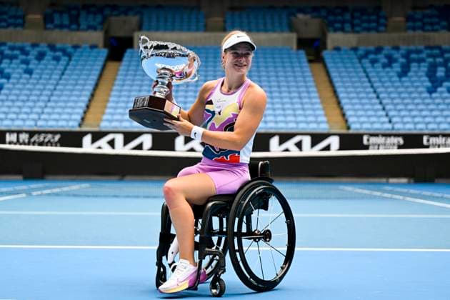 TENNIS AUSTRALIAN OPEN, Diede De Groot of the Netherlands poses for photographs with the winner?s trophy after winning her Women?s Wheelchair singles final match against Yui Kamiji of Japan at the 2023 Australian Open tennis championship at Melbourne Park in Melbourne, Saturday, January 28, 2023. ( NO ARCHIVING, EDITORIAL USE ONLY, NO USE IN BOOKS WITHOUT CONSENT MELBOURNE VICTORIA AUSTRALIA  Copyright: xLUKASxCOCHx 20230128001757405584