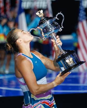Melbourne, Australia. 28th. Jan., 2023. Winner Aryna Sabalenka holding the trophy of the Australian Open 2023 tournament at Melbourne Park on Saturday 28 January 202 Â Copyright: xJuergenxHasenkopfx