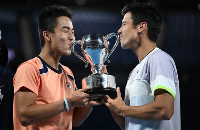 TENNIS AUSTRALIAN OPEN, Australian?s Rinky Hijikata (left) and Jason Kubler celebrate winning the men?s doubles final against Hugo Nys of Monaco and Jan Zielinski of Poland at the 2023 Australian Open tennis championship at Melbourne Park in Melbourne, Saturday, January 28, 2023. ( NO ARCHIVING, EDITORIAL USE ONLY, NO USE IN BOOKS WITHOUT CONSENT MELBOURNE VICTORIA AUSTRALIA  Copyright: xJamesxRossx 20230129001757543793