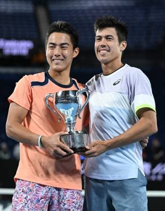 TENNIS AUSTRALIAN OPEN, Australian?s Rinky Hijikata (left) and Jason Kubler celebrate winning the men?s doubles final against Hugo Nys of Monaco and Jan Zielinski of Poland at the 2023 Australian Open tennis championship at Melbourne Park in Melbourne, Saturday, January 28, 2023. ( NO ARCHIVING, EDITORIAL USE ONLY, NO USE IN BOOKS WITHOUT CONSENT MELBOURNE VICTORIA AUSTRALIA  Copyright: xJamesxRossx 20230129001757545240
