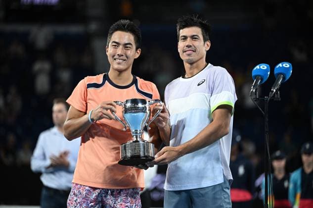 TENNIS AUSTRALIAN OPEN, Australian?s Rinky Hijikata (left) and Jason Kubler pose for photographs after winning the men?s doubles final against Hugo Nys of Monaco and Jan Zielinski of Poland at the 2023 Australian Open tennis championship at Melbourne Park in Melbourne, Saturday, January 28, 2023. ( NO ARCHIVING, EDITORIAL USE ONLY, NO USE IN BOOKS WITHOUT CONSENT MELBOURNE VICTORIA AUSTRALIA  Copyright: xJamesxRossx 20230129001757545644