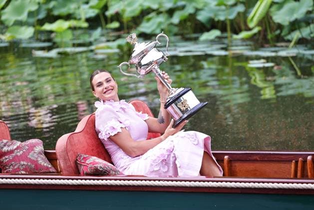 Aryna Sabalenka, BLR, presenting her trophy during a photoshoot in the botanical gardens after 2023 Australian Open in Melbourne, 29 01 2023; -