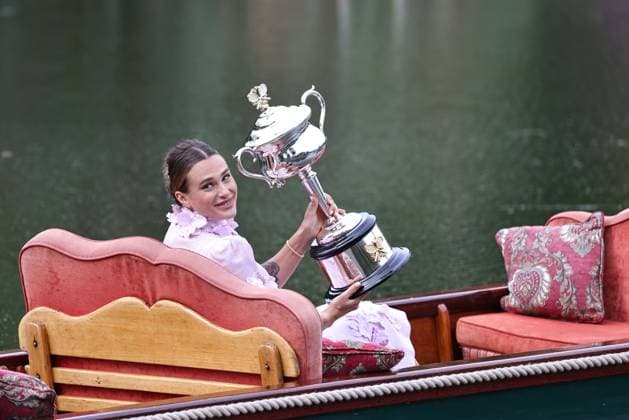 Aryna Sabalenka, BLR, presenting her trophy during a photoshoot in the botanical gardens after 2023 Australian Open in Melbourne, 29 01 2023; -