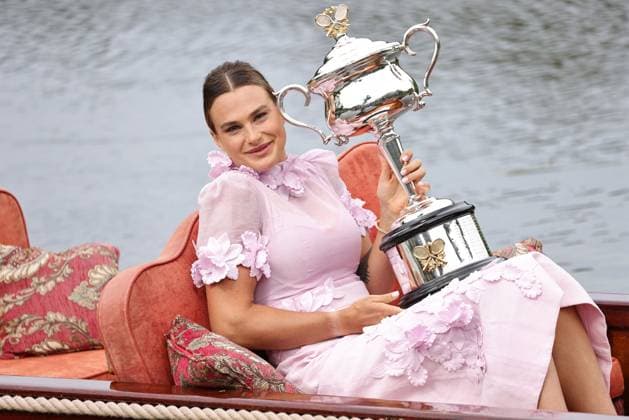 Aryna Sabalenka, BLR, presenting her trophy during a photoshoot in the botanical gardens after 2023 Australian Open in Melbourne, 29 01 2023; -