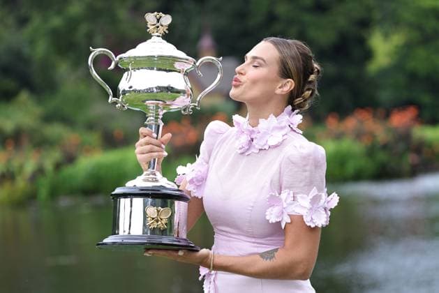 Aryna Sabalenka, BLR, presenting her trophy during a photoshoot in the botanical gardens after 2023 Australian Open in Melbourne, 29 01 2023; -