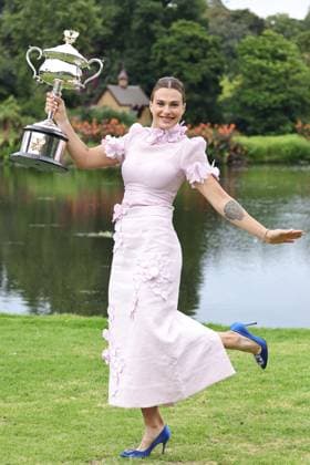 Aryna Sabalenka, BLR, presenting her trophy during a photoshoot in the botanical gardens after 2023 Australian Open in Melbourne, 29 01 2023; -
