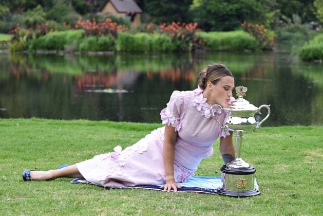 Aryna Sabalenka, BLR, presenting her trophy during a photoshoot in the botanical gardens after 2023 Australian Open in Melbourne, 29 01 2023; -