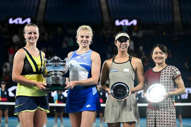 TENNIS AUSTRALIAN OPEN, Barbora Krejcikova and Katerina Siniakova of the Czech Republic and Shuko Aoyama and Ena Shibahara of Japan pose for photographs with their trophies after winning their Women?s doubles final match at the 2023 Australian Open tennis tournament at Melbourne Park in Melbourne, Sunday, January 29, 2023. ( NO ARCHIVING, EDITORIAL USE ONLY, NO USE IN BOOKS WITHOUT CONSENT MELBOURNE VICTORIA AUSTRALIA  Copyright: xLUKASxCOCHx 20230129001757852744