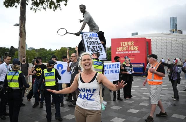TENNIS AUSTRALIAN OPEN, Extinction Rebellion protesters are see during a protest at the statue of Rod Laver at the 2023 Australian Open tennis championship at Melbourne Park in Melbourne, Sunday, January 29, 2023. ( NO ARCHIVING, EDITORIAL USE ONLY, NO USE IN BOOKS WITHOUT CONSENT MELBOURNE VICTORIA AUSTRALIA  Copyright: xJamesxRossx 20230129001757859920