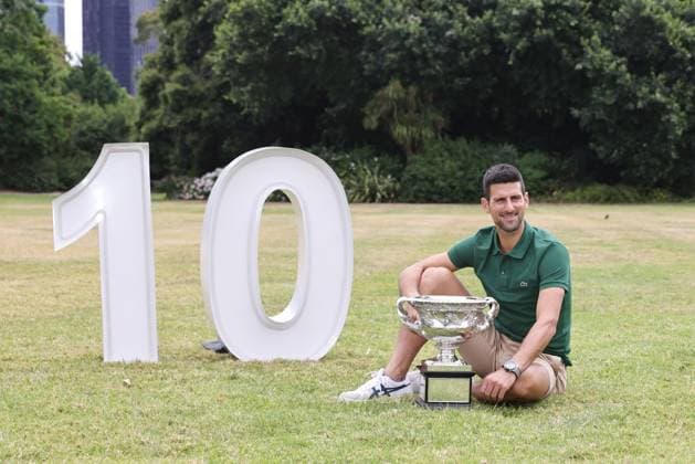 Novak Djokovic, SRB, presenting his trophy in the governmental house gardens after the 2023 Australian Open in Melbourne, 30 01 2023; -