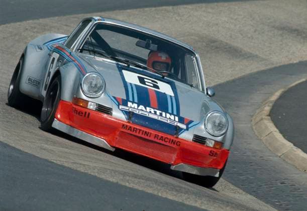 der Porsche 911 Carrera RSRvon Martini Racing des Fahrerteams Gijs an Lennep und Herbert Müller im Karussel beim 1000 km-Rennen 1973 im Gesamtklassements landen sie auf Platz 6 *** the Porsche 911 Carrera RSRof Martini Racing of the driver team Gijs an Lennep and Herbert Müller in the carousel at the 1000 km race 1973 in the overall classification they land on place 6