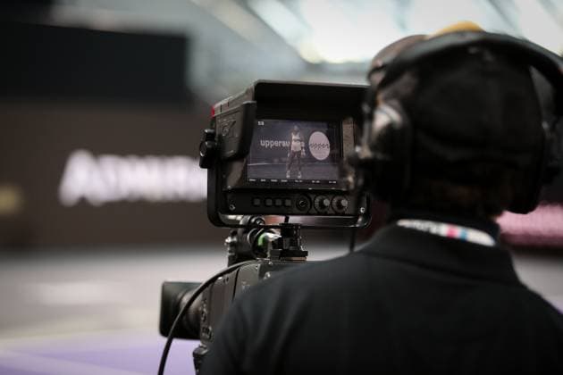 TENNIS - WTA, Tennis Damen Upper Austria Ladies Linz LINZ,AUSTRIA,08.FEB.23 - TENNIS - WTA Tour, Upper Austria Ladies Linz. Image shows a feature of a camera man.  GEPAxpictures xManfredxBinder