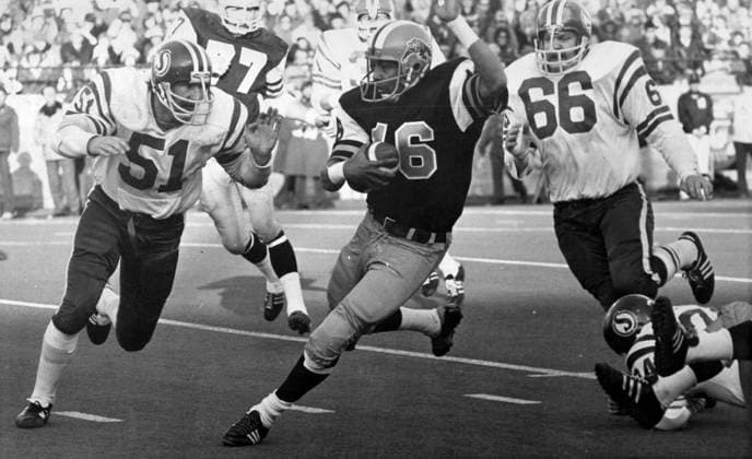 August 2, 2006, HAMILTON, ON, Canada: Hamilton Tiger-Cats quarterback Chuck Ealey (16) moves down the field with Steve Svitak (51) and Tim Roth (66) of Saskatchewan Roughriders in pursuit during the 1972 Grey Cup game in Hamilton, Ont., on Dec. 3, 1972. Long before there was Patrick Mahomes, Jalen Hurts, Doug Williams or even Warren Moon, there was Chuck Ealey. Canada News - August 2, 2006  - ZUMAc35_ 20060802_zaf_c35_001 Copyright: xThexCanadianxPressx