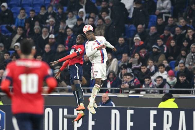 Sinaly Dimande (lyon) vs Timothy Weah (lille) FOOTBALL: Olympique Lyonnais vs Lille Olympique Sporting Club - 8e Coupe de France - 08 02 2023 FredericChambert Panoramic 