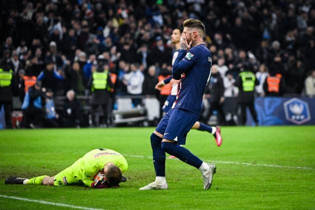 (230209) -- MARSEILLE, Feb. 9, 2023 -- Paris Saint-Germain s Sergio Ramos (R) reacts during the French Cup round of 16 football match between Olympique de Marseille (OM) and Paris Saint-Germain (PSG) at the Velodrome stadium in Marseille, Feb. 8, 2023. (Photo by Clement Mahoudeau Xinhua) (SP)FRANCE-MARSEILLE-FOOTBALL-FRENCH CUP-PSG VS OM CxLEMENTMAHOUDEAUgaojing 