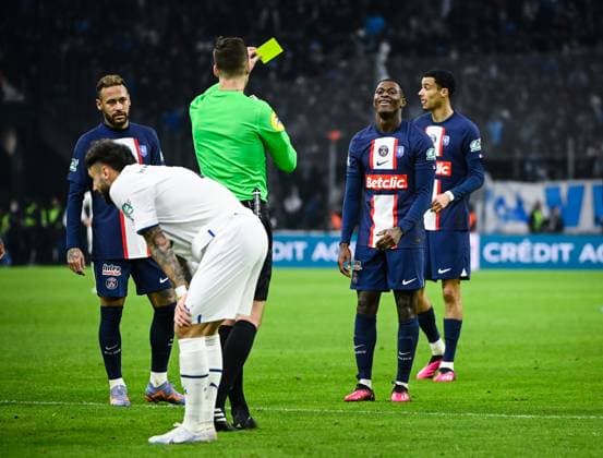 (230209) -- MARSEILLE, Feb. 9, 2023 -- Paris Saint-Germain s Nuno Mendes (2nd R) receives a yellow card during the French Cup round of 16 football match between Olympique de Marseille (OM) and Paris Saint-Germain (PSG) at the Velodrome stadium in Marseille, Feb. 8, 2023. (Photo by Clement Mahoudeau Xinhua) (SP)FRANCE-MARSEILLE-FOOTBALL-FRENCH CUP-PSG VS OM CxLEMENTMAHOUDEAUgaojing 