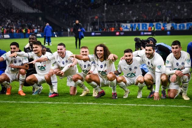 (230209) -- MARSEILLE, Feb. 9, 2023 -- Marseille s players celebrate their victory after the French Cup round of 16 football match between Olympique de Marseille (OM) and Paris Saint-Germain (PSG) at the Velodrome stadium in Marseille, Feb. 8, 2023. (Photo by Clement Mahoudeau Xinhua) (SP)FRANCE-MARSEILLE-FOOTBALL-FRENCH CUP-PSG VS OM CxLEMENTMAHOUDEAUgaojing 