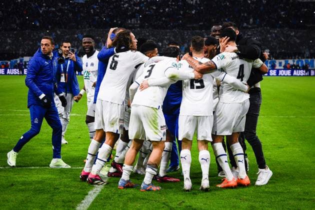 (230209) -- MARSEILLE, Feb. 9, 2023 -- Marseille s players celebrate their victory after the French Cup round of 16 football match between Olympique de Marseille (OM) and Paris Saint-Germain (PSG) at the Velodrome stadium in Marseille, Feb. 8, 2023. (Photo by Clement Mahoudeau Xinhua) (SP)FRANCE-MARSEILLE-FOOTBALL-FRENCH CUP-PSG VS OM CxLEMENTMAHOUDEAUgaojing 