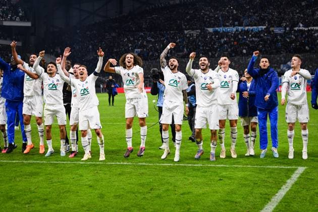 (230209) -- MARSEILLE, Feb. 9, 2023 -- Marseille s players celebrate their victory after the French Cup round of 16 football match between Olympique de Marseille (OM) and Paris Saint-Germain (PSG) at the Velodrome stadium in Marseille, Feb. 8, 2023. (Photo by Clement Mahoudeau Xinhua) (SP)FRANCE-MARSEILLE-FOOTBALL-FRENCH CUP-PSG VS OM CxLEMENTMAHOUDEAUgaojing 