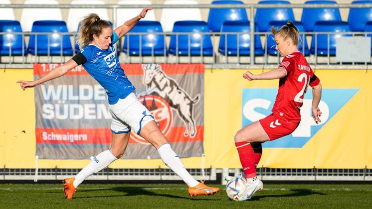 v.li.: Fabienne Dongus (TSG, 33), Weronika Zawistowska (Köln, 24), Zweikampf, Spielszene, Duell, duel, tackle, tackling, Dynamik, Action, Aktion, 12.02.2023, Sinsheim (Hoffenheim) (Deutschland), Fussball, Flyeralarm Frauen-Bundesliga, TSG 1899 Hoffenheim - 1. FC Köln, 12.02.2023, Sinsheim (Hoffenheim) (Deutschland), Fussball, Flyeralarm Frauen-Bundesliga, TSG 1899 Hoffenheim - 1. FC Köln, DFB DFL REGULATIONS PROHIBIT ANY USE OF PHOTOGRAPHS AS IMAGE SEQUENCES AND OR QUASI-VIDEO.