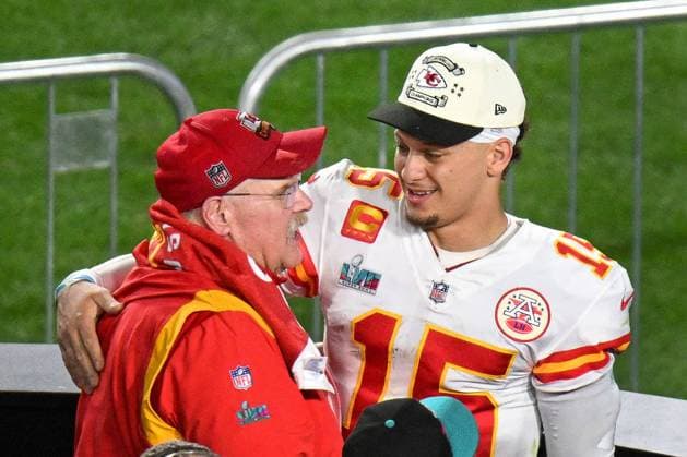 Kansas City Chiefs quarterback Patrick Mahomes (15) celebrates with coach Andy Reid after defeating the Philadelphia Eagles 38-35 in Super Bowl LVII at State Farm Stadium in Glendale, Arizona, on Sunday, February 12, 2023.  SBP20230212467 JONxSOOHOO