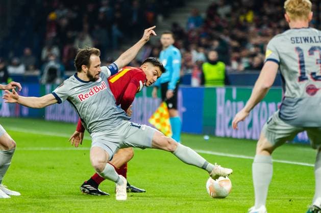 SOCCER - UEFA EL, RBS vs Roma SALZBURG,AUSTRIA,16.FEB.23 - SOCCER - UEFA Europa League, play off, Red Bull Salzburg vs AS Roma. Image shows Andreas Ulmer (RBS) and Paulo Dybala (Roma).  GEPAxpictures xGintarexKarpaviciute
