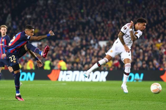 Mandatory Credit: Photo by Simon Dael Shutterstock (13765759r) Raphinha of Barcelona with a shot on goal Barcelona v Manchester United, ManU UEFA Europa League, Play-Off Round, First Leg, Football, Camp Nou, Barcelona, Spain - 16 Feb 2023 EDITORIAL USE ONLY No use with unauthorised audio, video, data, fixture lists, club league logos or live services. Online in-match use limited to 120 images, no video emulation. No use in betting, games or single club league player publications. Barcelona v Manchester United, UEFA Europa League, Play-Off Round, First Leg, Football, Camp Nou, Barcelona, Spain - 16 Feb 2023 EDITORIAL USE ONLY No use with unauthorised audio, video, data, fixture lists, club league logos or live services. Online in-match use limited to 120 images, no video emulation. No use in betting, games or single club league player publications.  Copyright: xSimonxDael Shutterstockx 13765759r