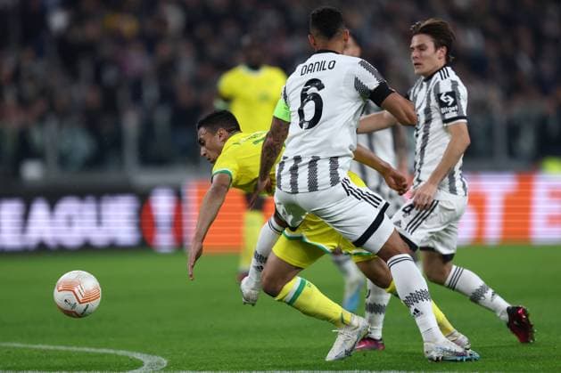 Juventus Fc - Fc Nantes Mostafa Mohamed of Fc Nantes and Danilo Luiz da Silva of Juventus Fc battle for the ball during the Uefa Europa League first leg knockout round play-off match beetween Juventus Fc and Fc Nantes at Allianz Stadium on Februart 16 2023 in Turin, Italy . Turin Allianz Stadium Italy Copyright: xMarcoxCanoniero syncx