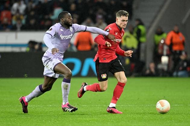 Leverkusen, Bayarena, 16.02.23, GER, Herren, UEFA Europa League, Bayer 04 Leverkusen - AS Monaco Bild: v. li. im Zweikampf Youssouf Fofana (AS Monaco) und Florian Wirtz (Leverkusen) Nur fuer journalistische Zwecke! Only for editorial use! Gemaess den Vorgaben der DFL Deutsche Fußball Liga ist es untersagt, in dem Stadion und oder vom Spiel angefertigte Fotoaufnahmen in Form von Sequenzbildern und oder videoaehnlichen Fotostrecken zu verwerten bzw. verwerten zu lassen. DFL regulations prohibit any use of photographs as image sequences and or quasi-video. Nordrhein-Westfalen Deutschland