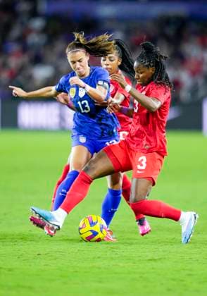 ORLANDO, FL - FEBRUARY 16: the United States forward Alex Morgan (13) and Canada defender Kadeisha Buchanan (3) during the She Believes soccer match between the USA and Canada on February 16, 2022 at Explorer Stadium in Orlando, FL. (Photo by Andrew Bershaw Icon Sportswire) SOCCER: FEB 16 Women™s SheBelieves Cup - USA vs Canada Icon2302160042